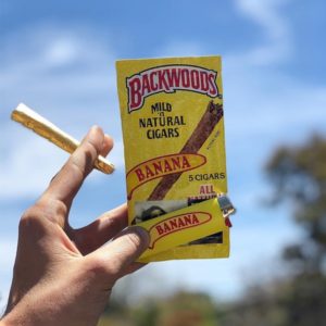 Backwoods - Banana 5 Pack held in sky